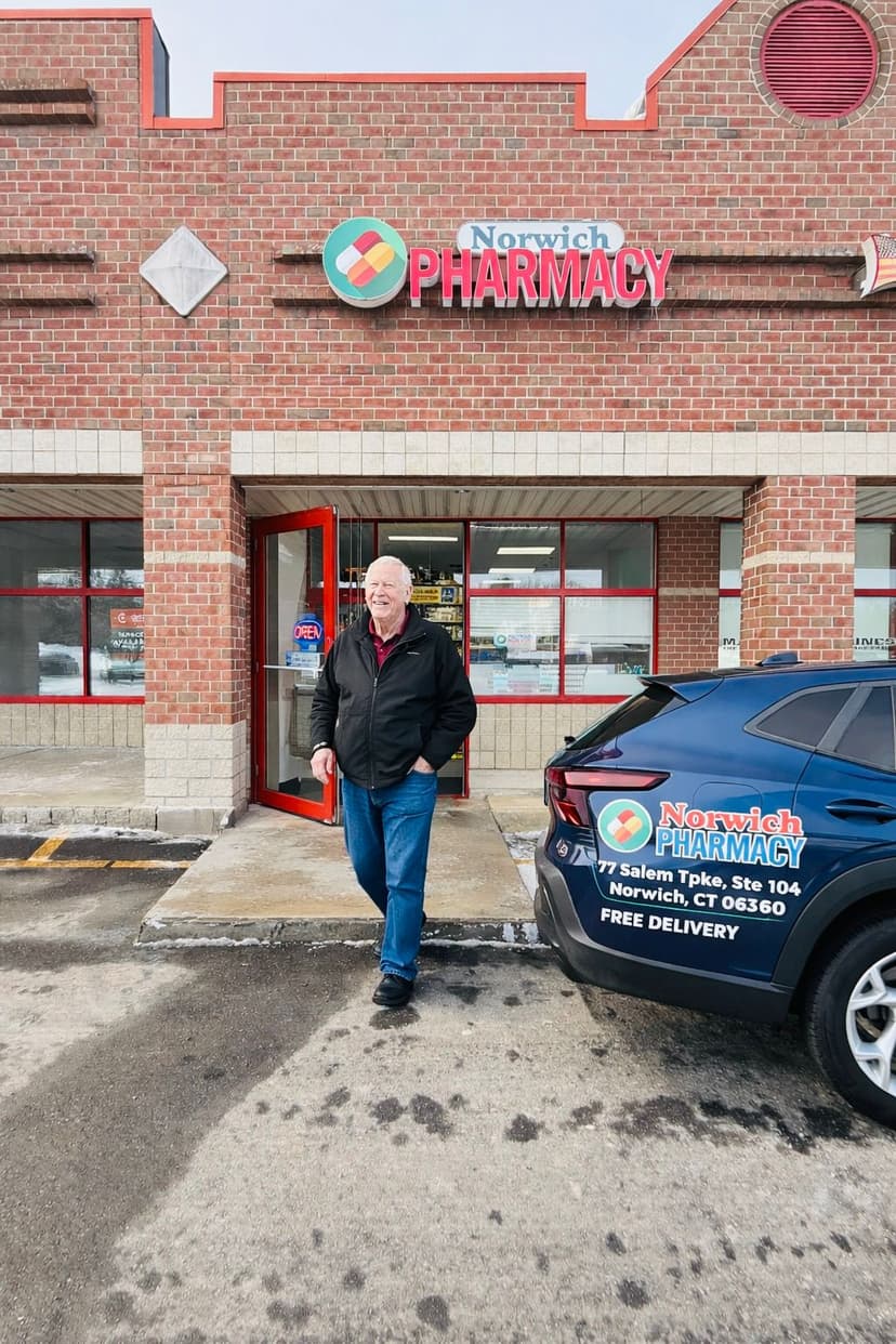 Interior of Norwich Pharmacy showing prescription area and products in Norwich, CT